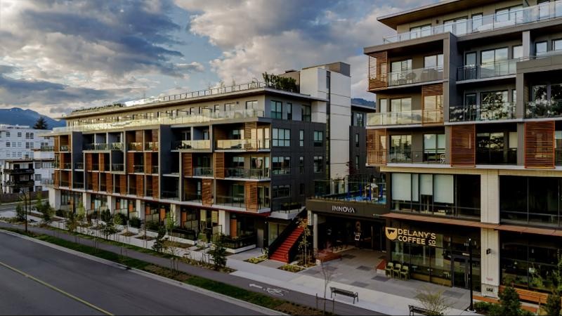 Innova buildings on East 3rd Street in Lower Lonsdale, North Vancouver, with Delany's Coffee at street level